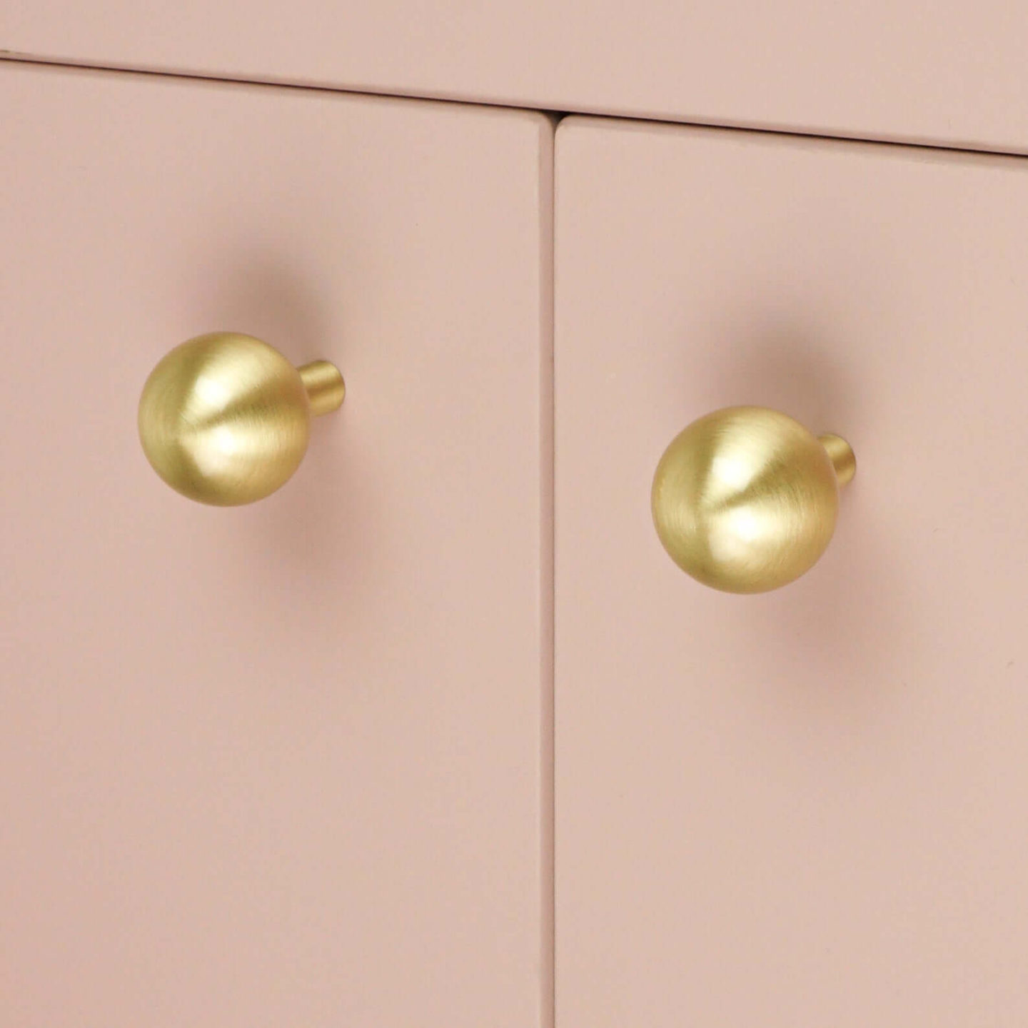 Brass ball cabinet handles.