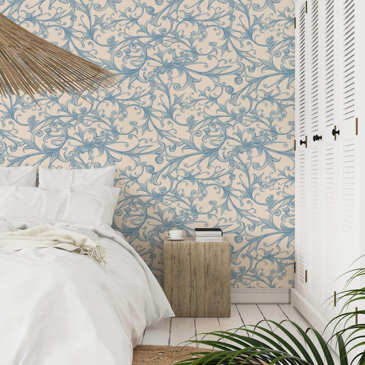 Peel and stick wallpaper with light blue vintage flowers set against a cream background.