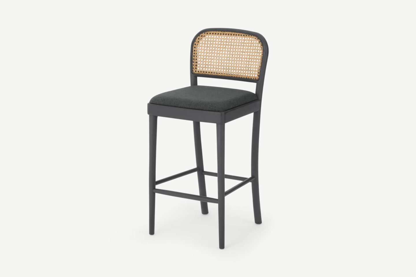A black counter stool with rattan backing.