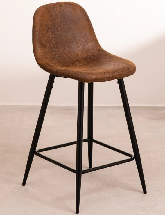 A dark brown leather stool with black legs.