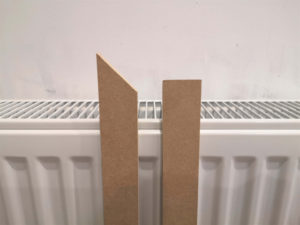 Two boards of MDF showing 45 degrees angle on the width and depth.