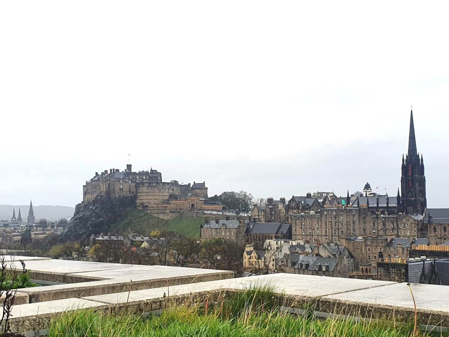 The view of Edinburgh castle from a nearby rooftop.