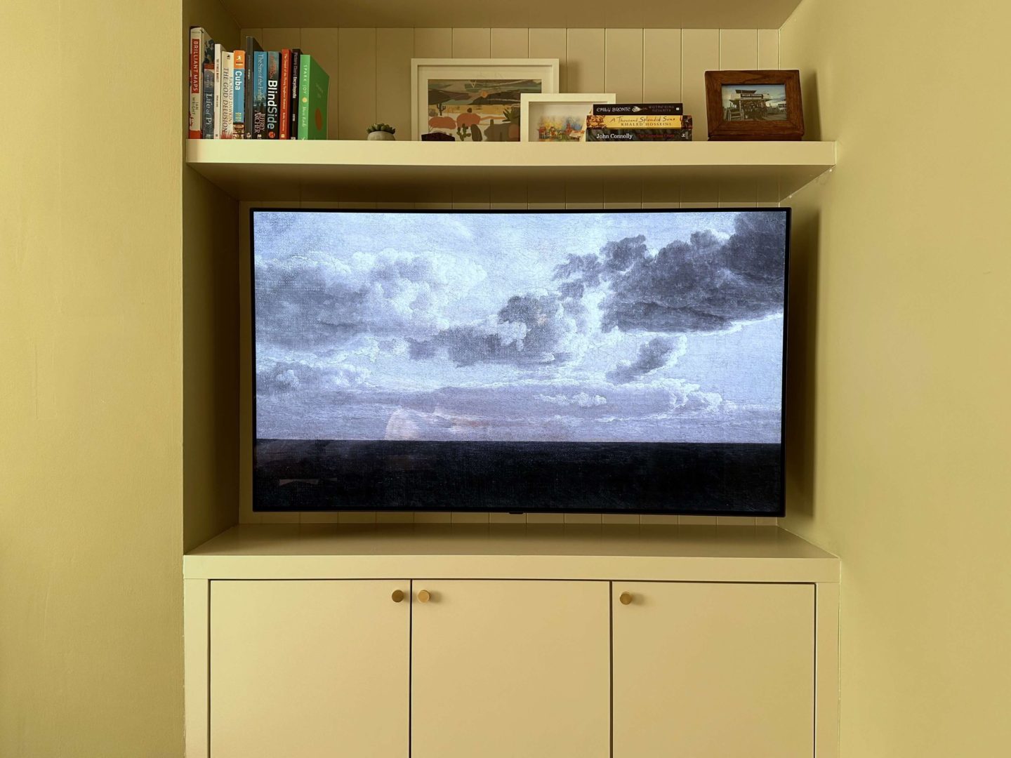 Tv artwork of a vintage coastal scene.